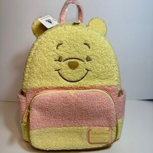 NWT. Disney Parks Loungefly Mini Backpack - Winnie The Pooh pale pastel